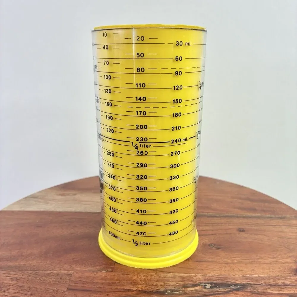 Vintage Metric Wonder Measuring Cup Adjustable Wet Dry 2 Cup Milmour USA Yellow